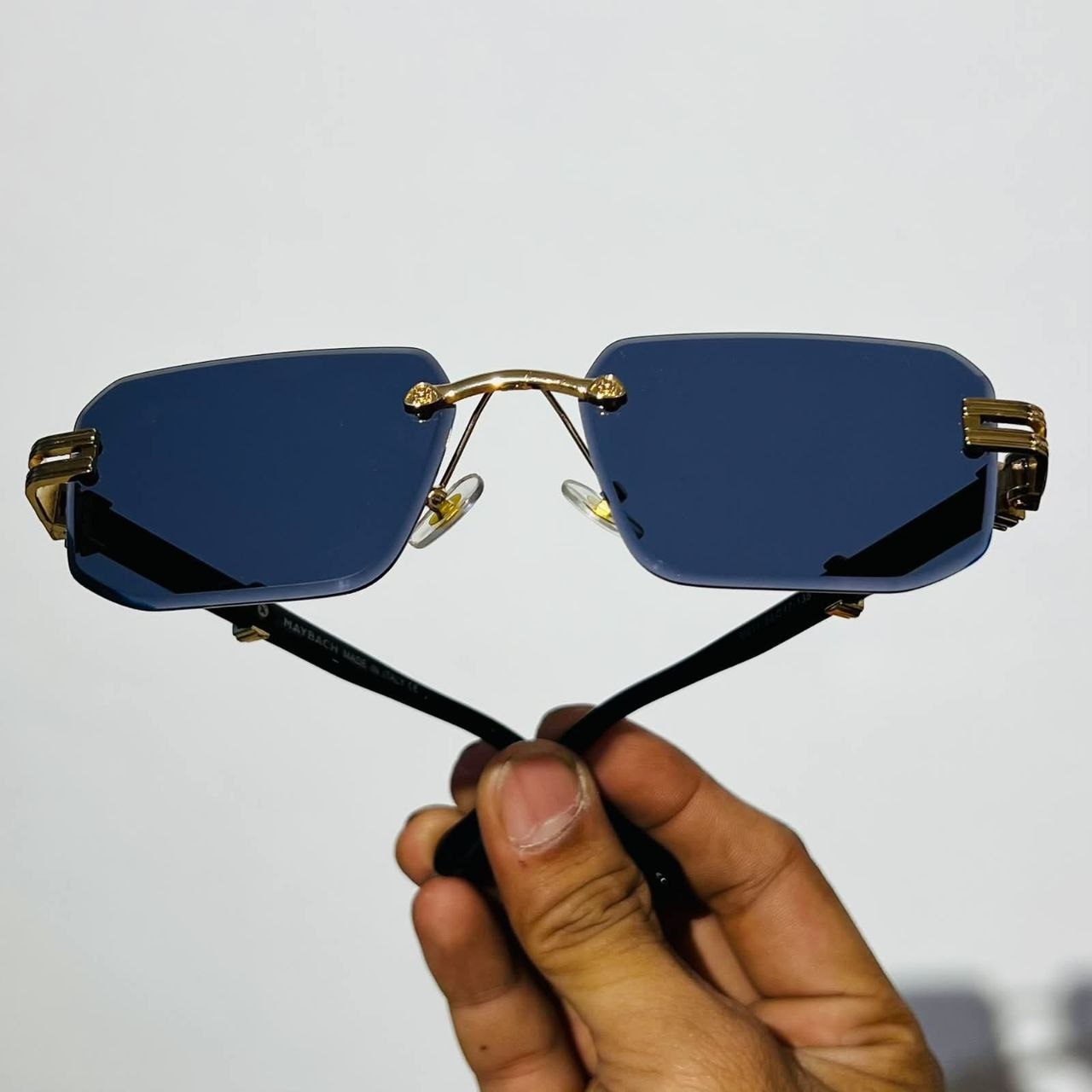 Blue frameless boxy glass shades