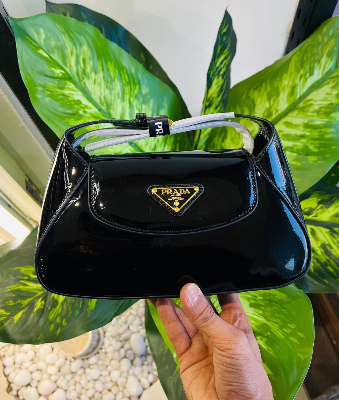 Black patent leather Prada shoulder bag