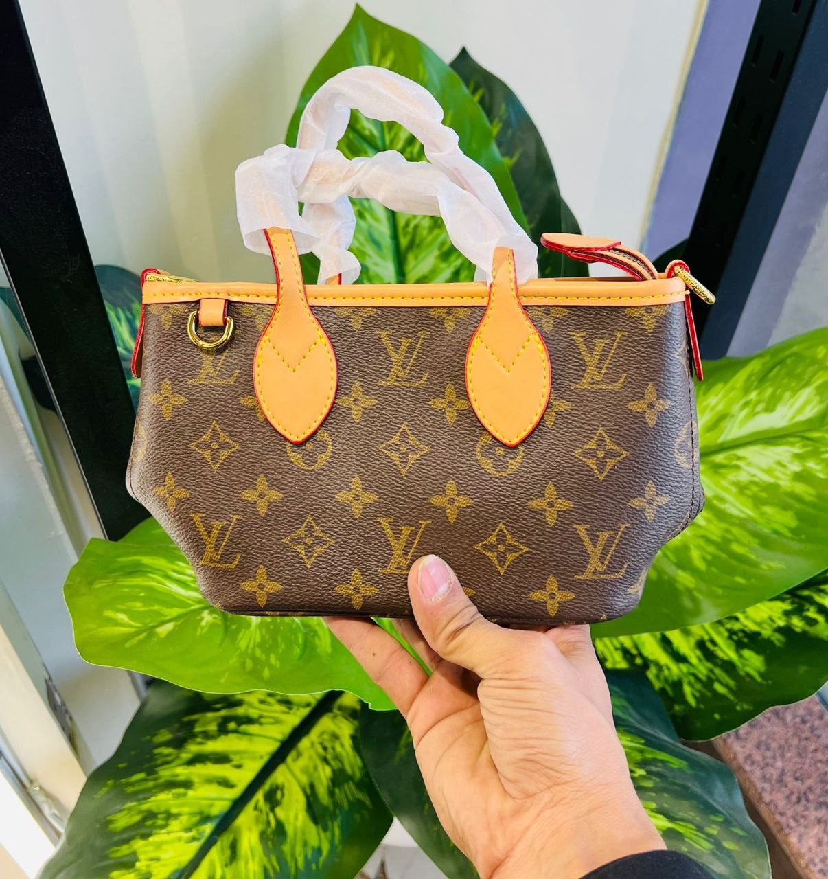 Louis Vuitton Neverfull BB in signature Monogram canvas