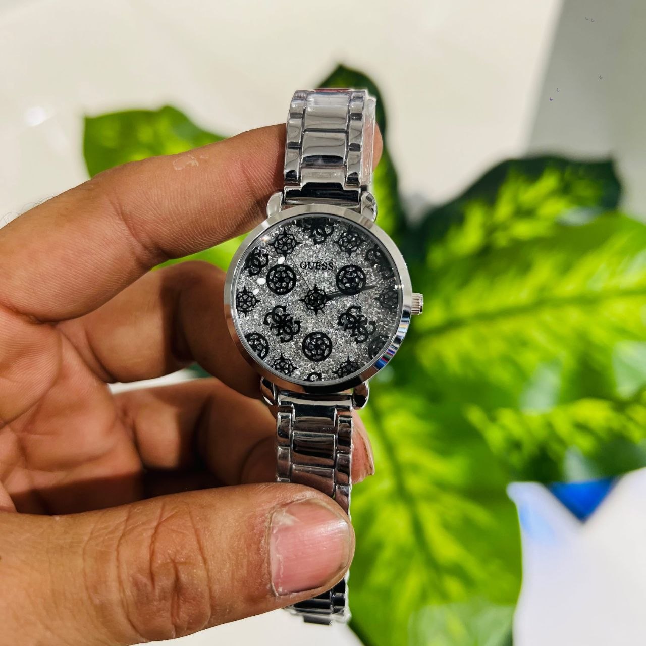 Guess Sugarplum Silver-Tone Women's Watch (GW0670L1), featuring a 38mm glitter dial