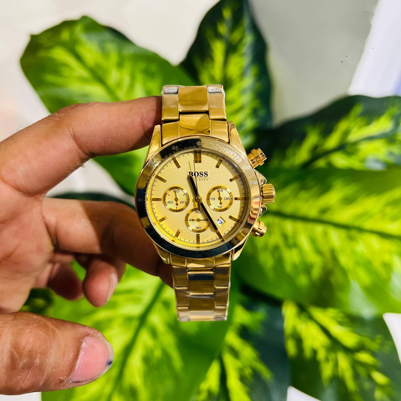 Gold-toned chronograph model branded as BOSS