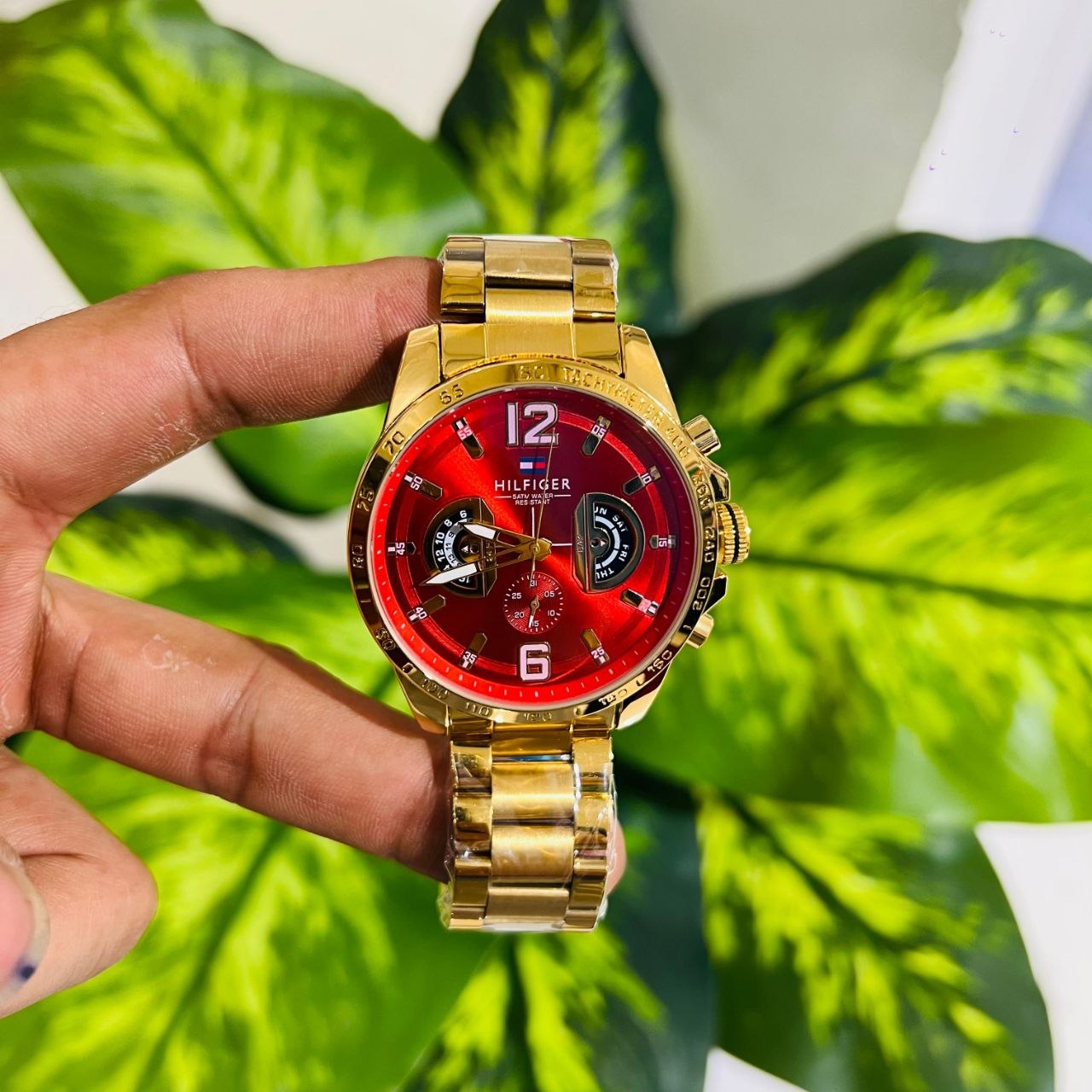 The gold-toned Tommy Hilfiger multifunction watch