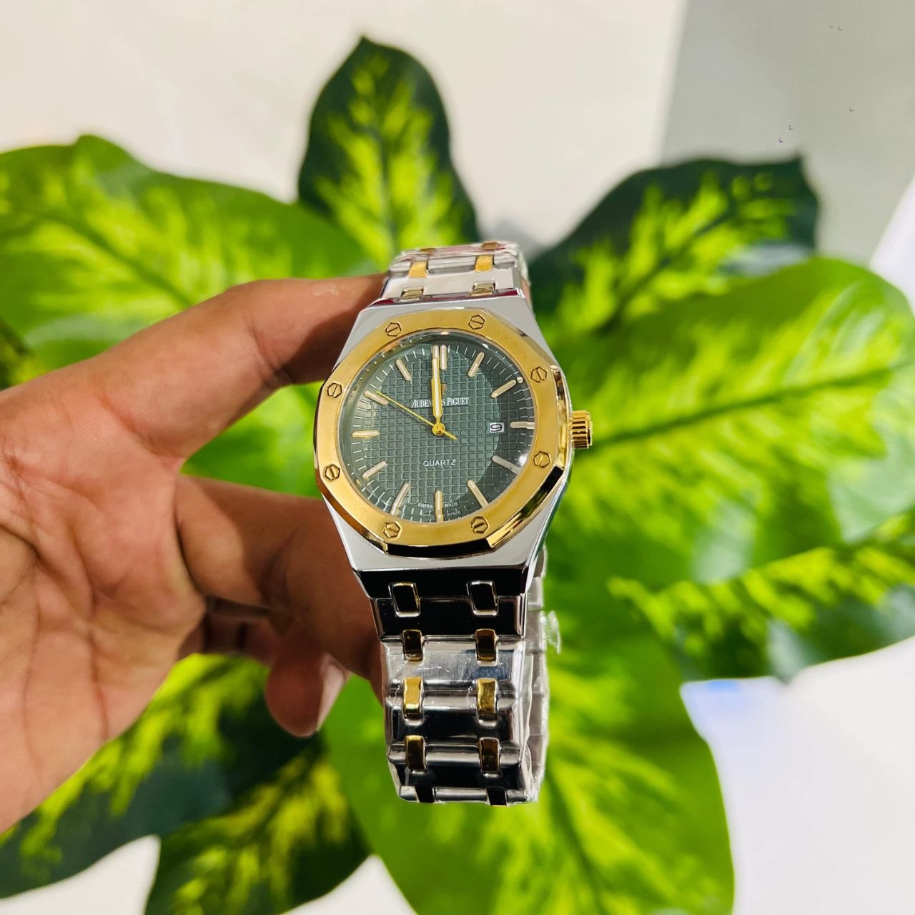 Two-tone quartz analog watch styled after the Audemars Piguet Royal