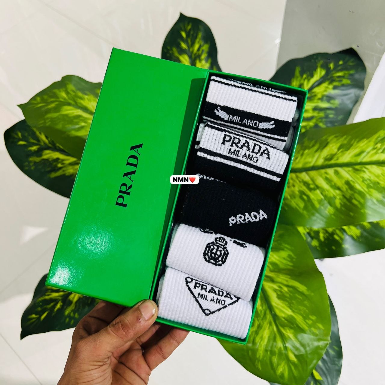 Prada 5-pack boxed sock set featuring contrasting black and white designs